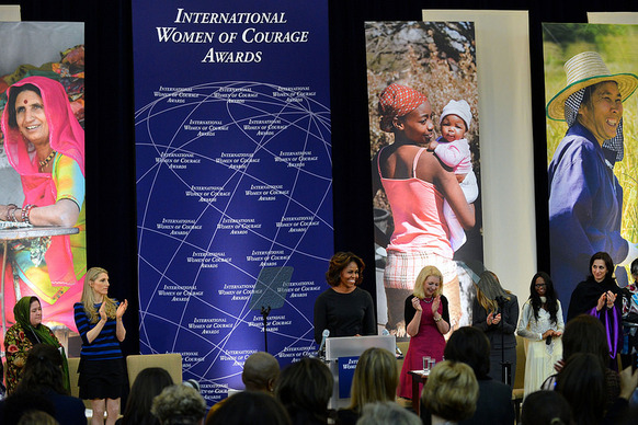 First Lady Michelle Obama honors extraordinary women from 10 countries with the 2014 Secretary of State’s International Women of Courage Award at the U.S. Department of State in Washington, D.C., on March 4, 2014. [State Department photo/ Public Domain]